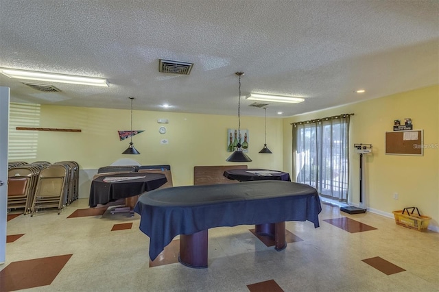 recreation room featuring a textured ceiling and billiards