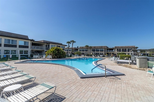 view of pool featuring a patio