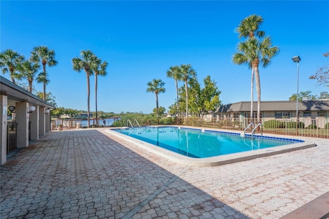 view of swimming pool featuring a patio