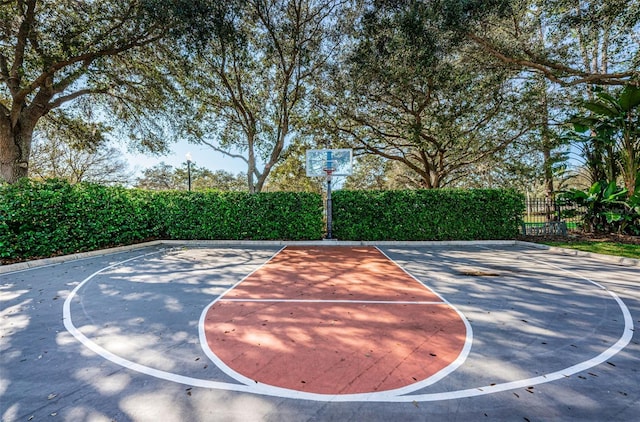 view of sport court with community basketball court and fence