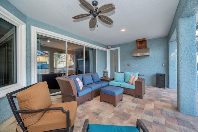 view of patio / terrace featuring ceiling fan and an outdoor hangout area