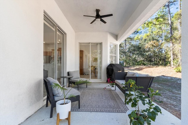 view of patio / terrace featuring ceiling fan, a grill, and an outdoor hangout area