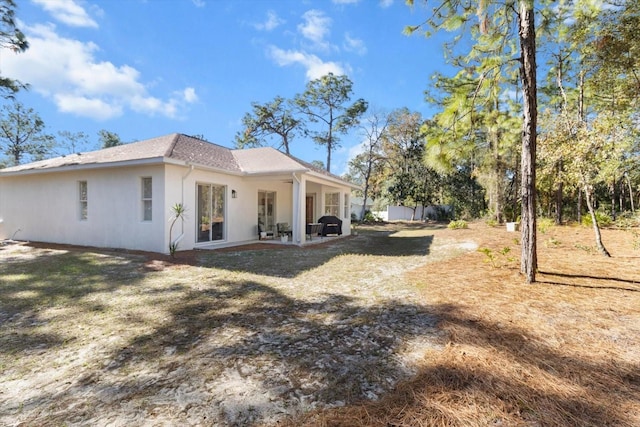 view of property exterior featuring a yard