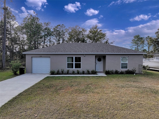 ranch-style house featuring a garage and a front lawn