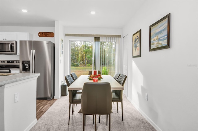 view of carpeted dining room