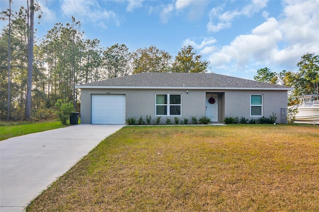 single story home with a front yard and a garage