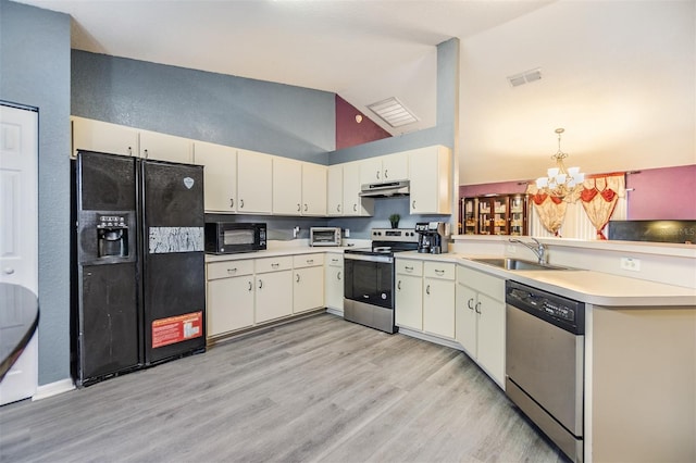 kitchen featuring sink, light hardwood / wood-style flooring, a notable chandelier, decorative light fixtures, and black appliances