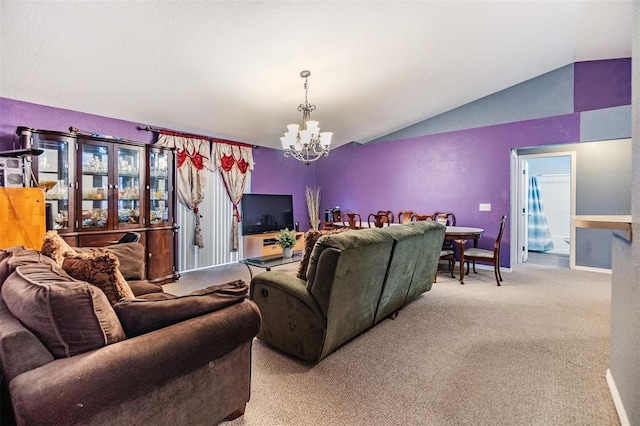 carpeted living room featuring a chandelier and lofted ceiling