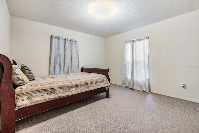 bedroom featuring a textured ceiling