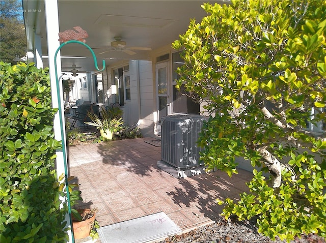 view of patio featuring central AC and ceiling fan