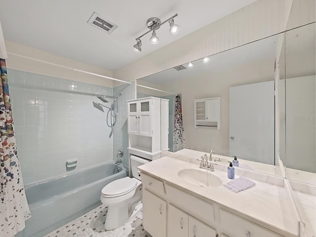 full bathroom featuring vanity, tile patterned flooring, shower / bathtub combination with curtain, and toilet