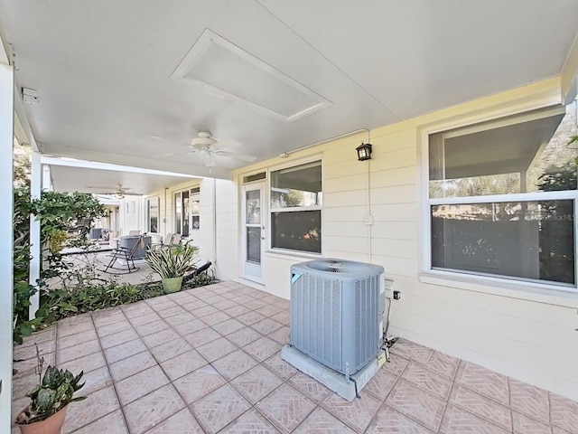 view of patio / terrace with ceiling fan and central AC unit