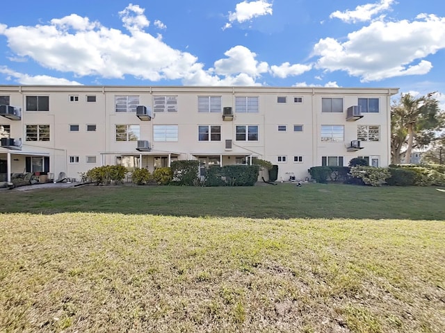 view of property featuring an AC wall unit