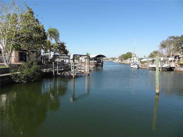 view of dock with a water view