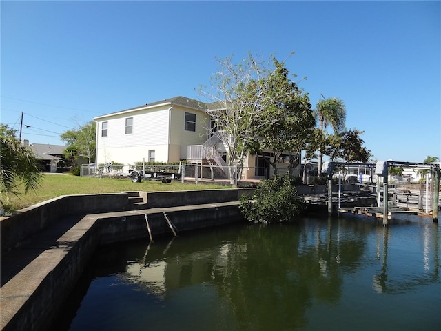 dock area with a water view