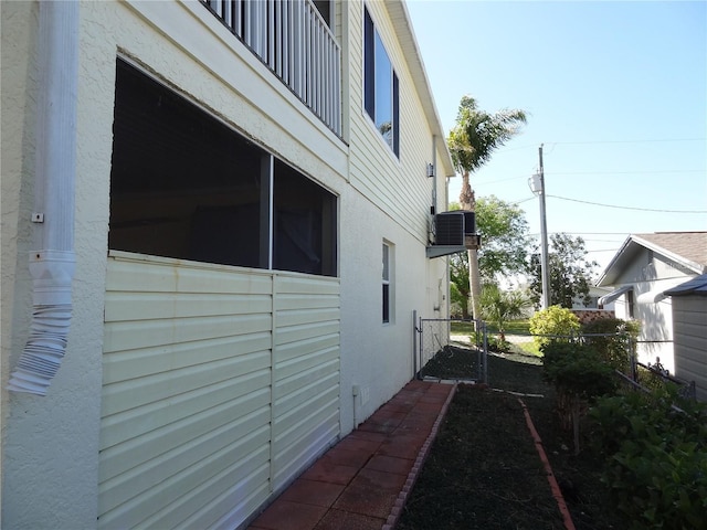 view of property exterior with cooling unit