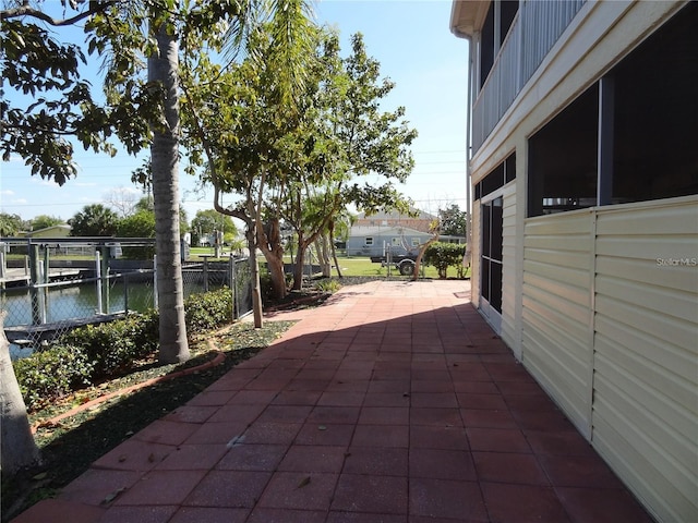 view of patio / terrace featuring a water view