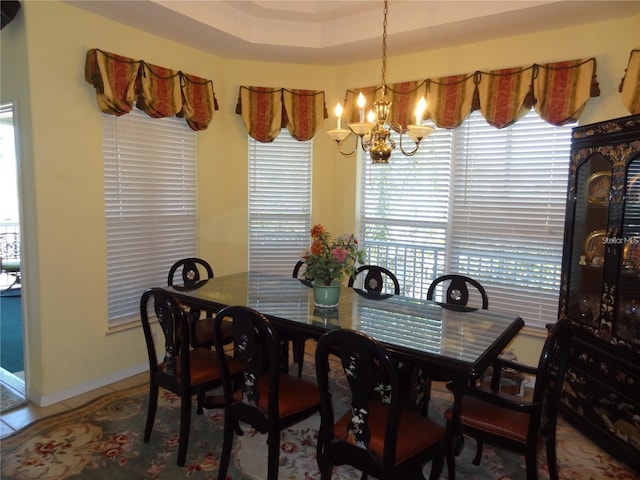 dining area featuring a chandelier