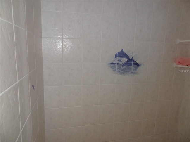 room details with a tile shower