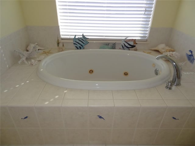 bathroom with tiled tub