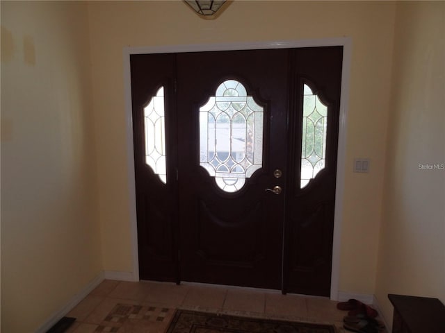 view of tiled foyer entrance