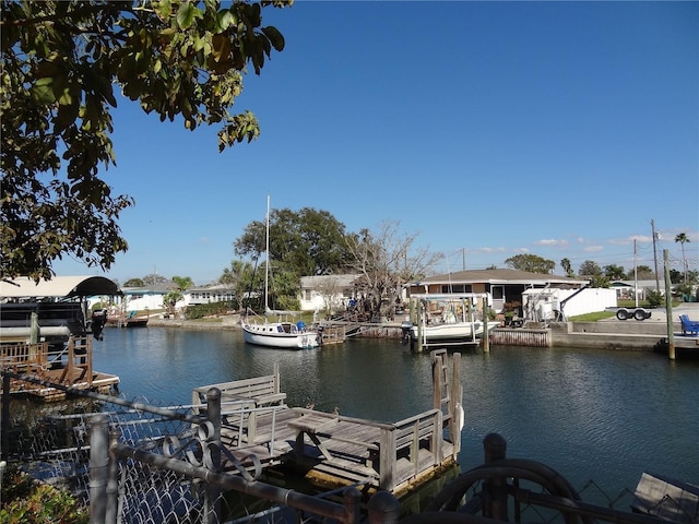 dock area with a water view