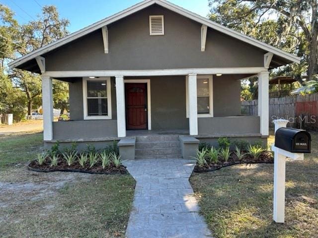 view of front of property featuring covered porch