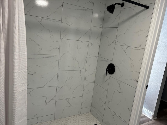 bathroom featuring a shower with curtain