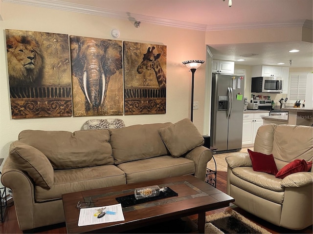 living room with ornamental molding