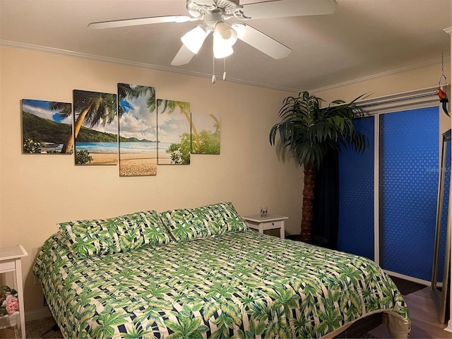 bedroom featuring crown molding and ceiling fan