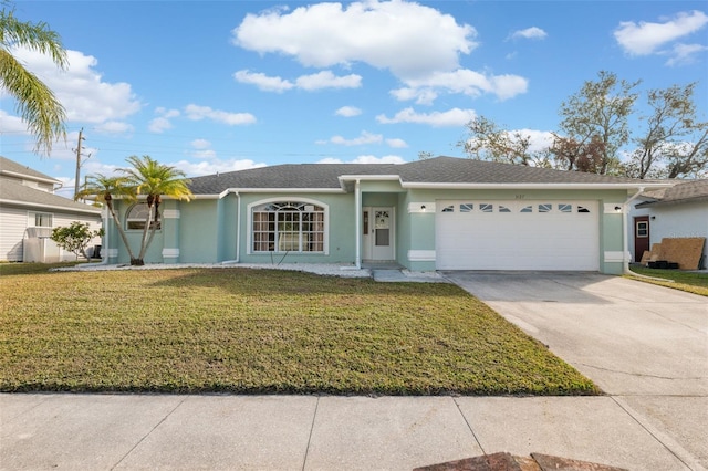 ranch-style house featuring a garage and a front yard