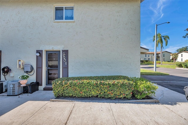 entrance to property with central air condition unit