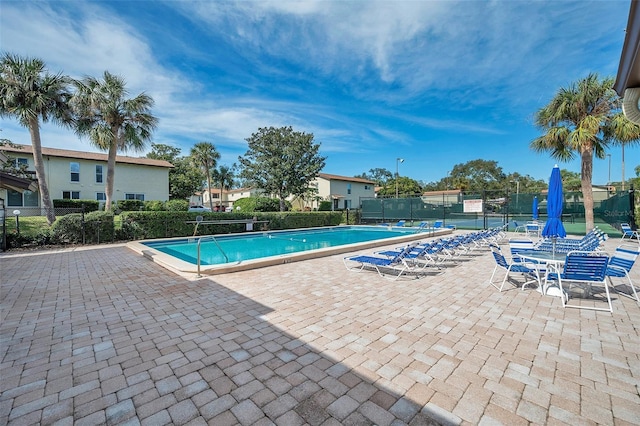 view of pool featuring a patio