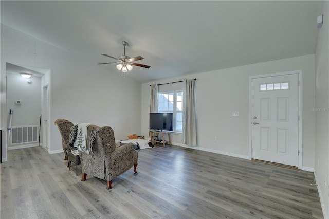 entryway with light wood-type flooring and ceiling fan