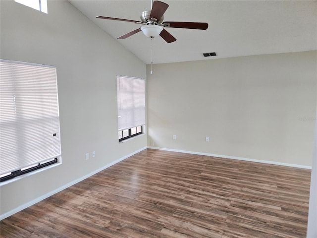 unfurnished room with ceiling fan, dark hardwood / wood-style flooring, and high vaulted ceiling