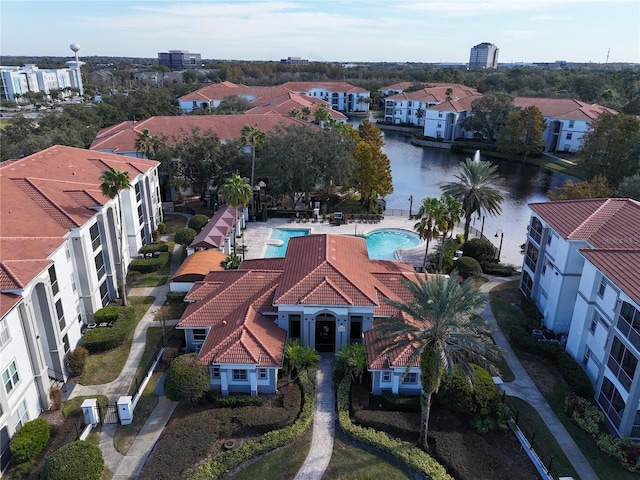 bird's eye view with a water view