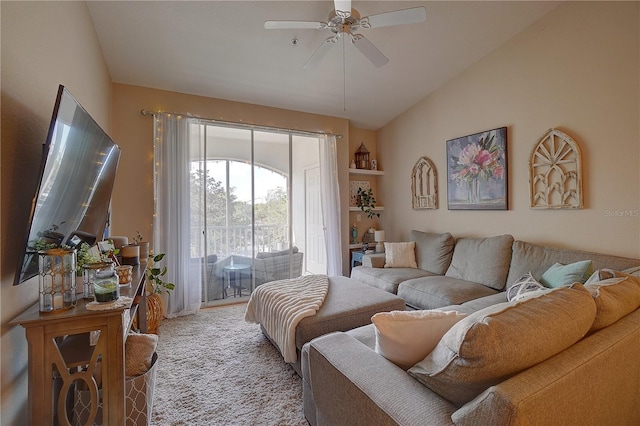 carpeted living room with ceiling fan and lofted ceiling