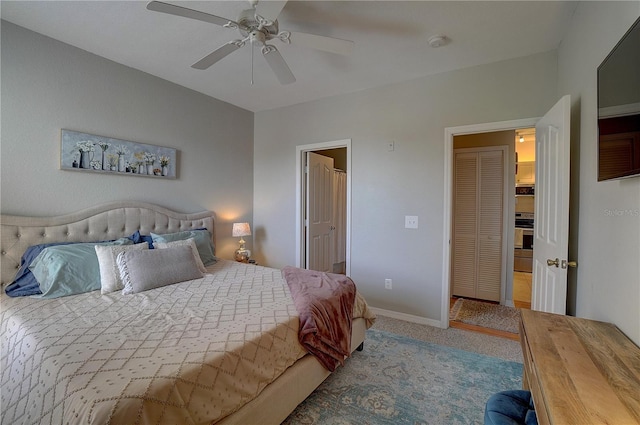 carpeted bedroom with ceiling fan