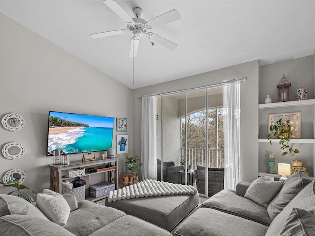 living area with lofted ceiling and ceiling fan