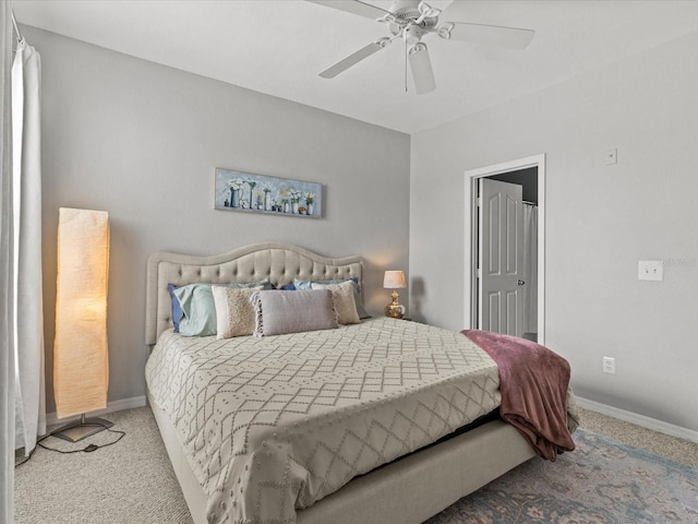 bedroom featuring carpet floors, baseboards, and a ceiling fan