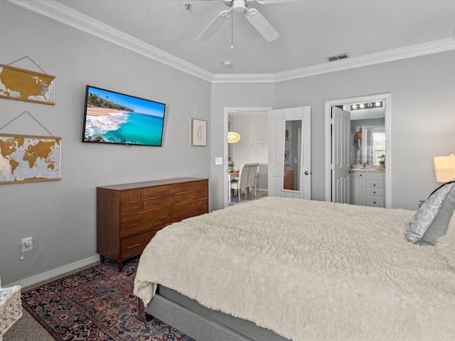 bedroom featuring baseboards, visible vents, connected bathroom, ceiling fan, and crown molding