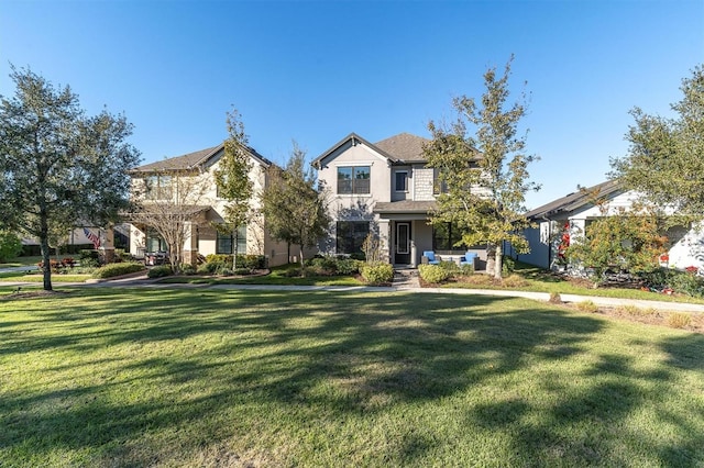 view of front of home with a front yard