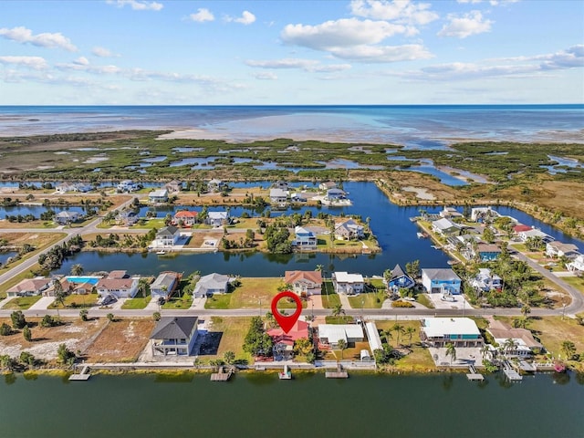 drone / aerial view featuring a water view