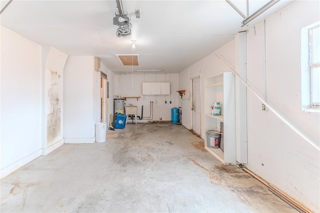 garage featuring water heater