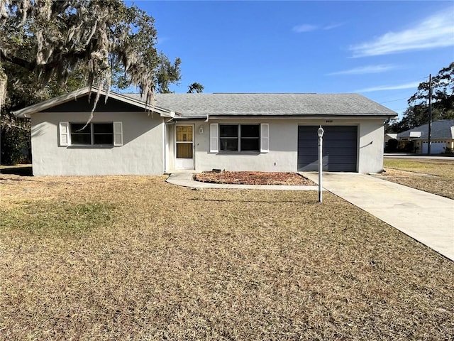 single story home featuring a garage