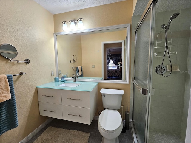 9163 Lingrove Rd, Weeki Wachee, FL 34613 - full bath with vanity, a shower stall, a textured wall, and a textured ceiling