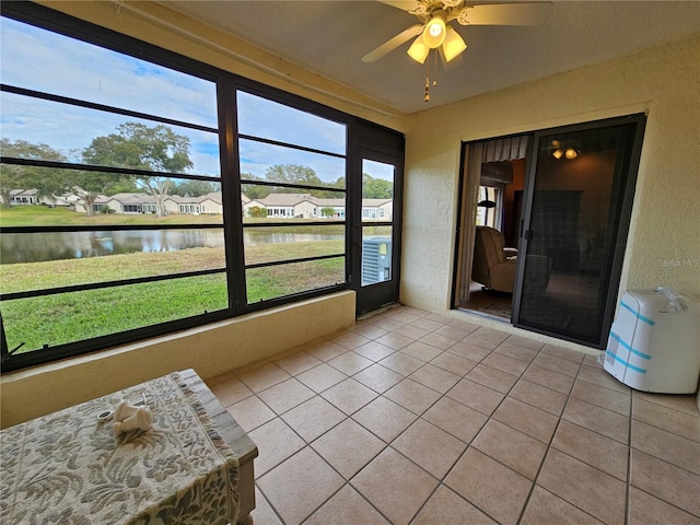 9163 Lingrove Rd, Weeki Wachee, FL 34613 - sunroom / solarium with a water view, ceiling fan, and a residential view