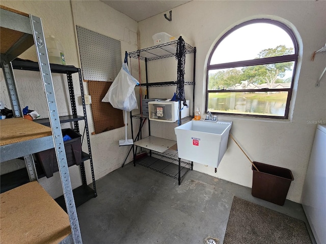 9163 Lingrove Rd, Weeki Wachee, FL 34613 - misc room featuring unfinished concrete flooring and a sink