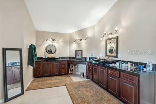 7941 Sycamore Dr, New Port Richey, FL 34654 - bathroom featuring tile patterned flooring and vanity