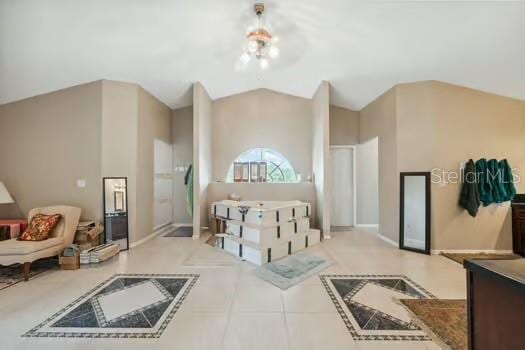 7941 Sycamore Dr, New Port Richey, FL 34654 - additional living space featuring vaulted ceiling and tile patterned floors